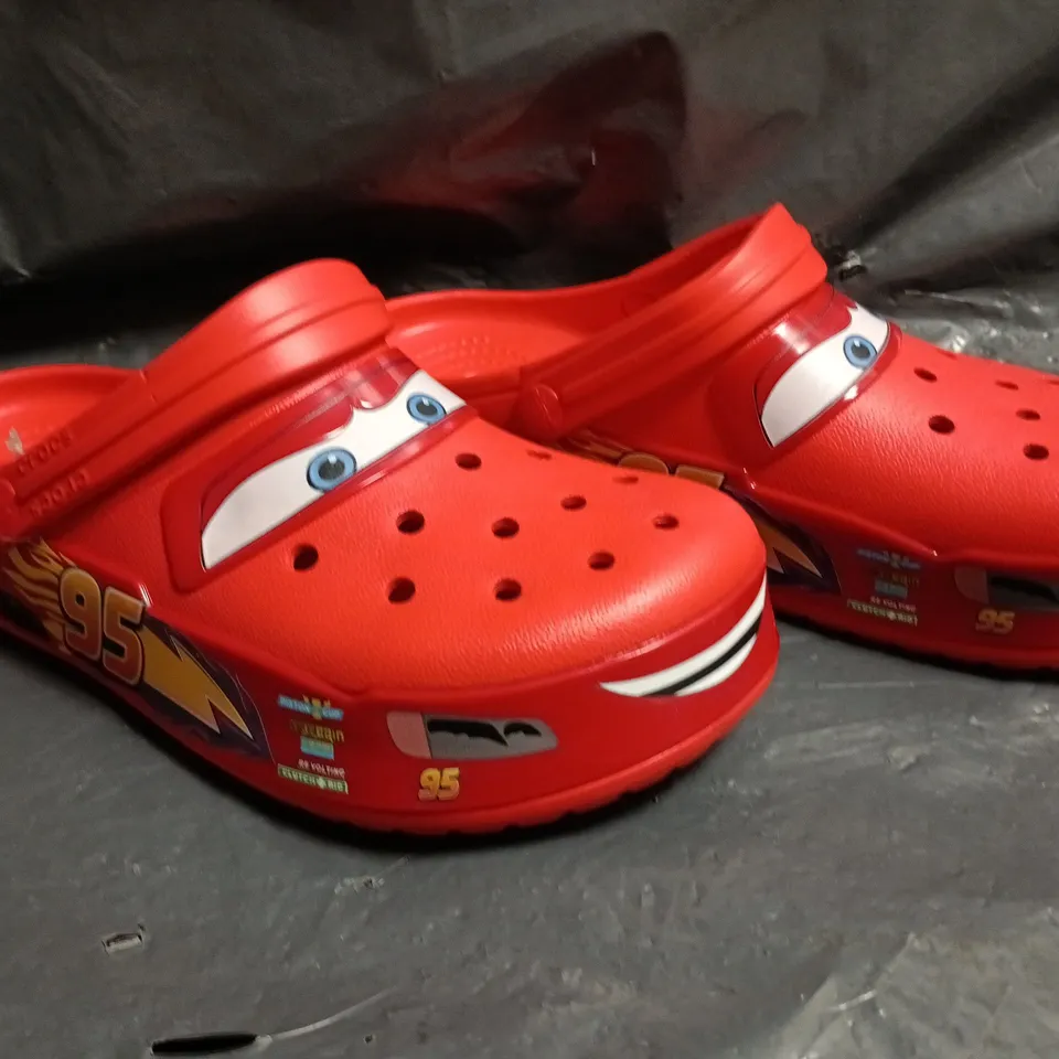 PAIR OF CROCS LIGHTNING MCQUEEN CLOGS SIZE UK M8/W9