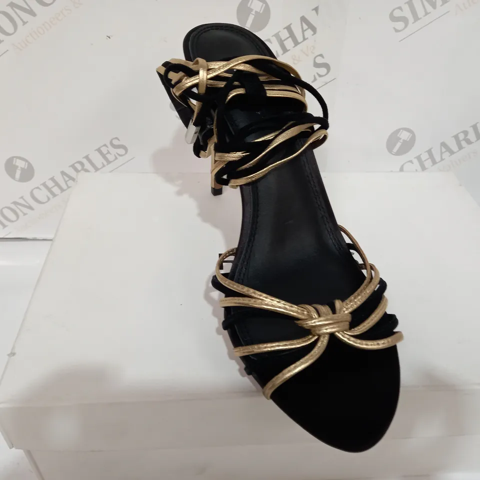 BOXED PAIR OF REISS CASSIDY STRAPPY HEELS IN BLACK/GOLD SIZE 6