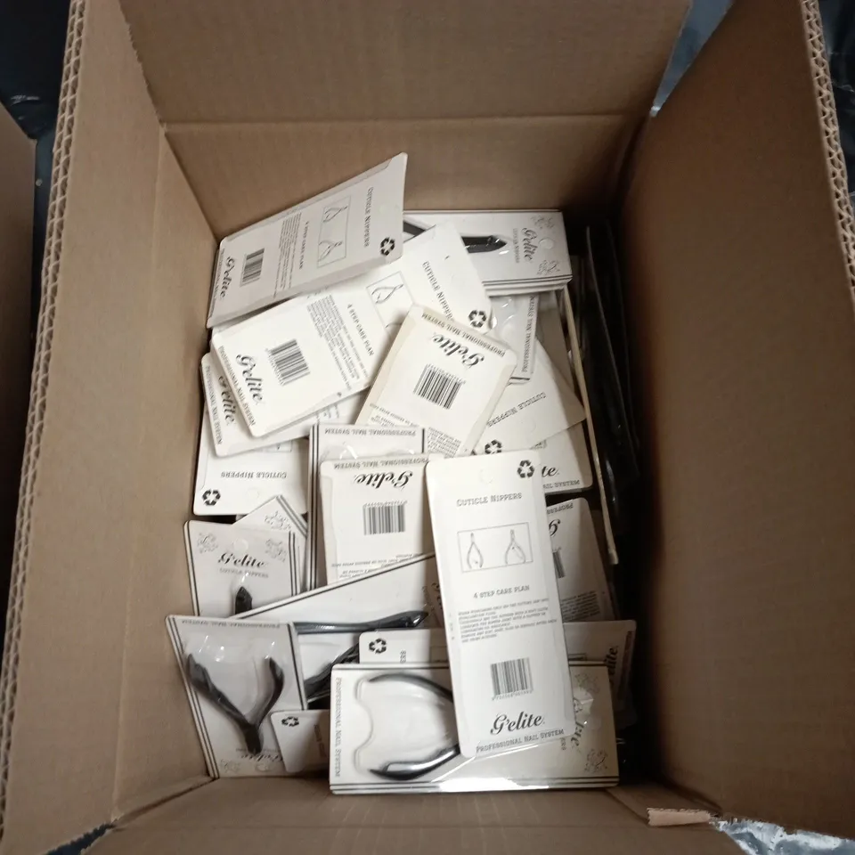 BOX OF APPROXIMATELY 40 CUTICLE NAIL CLIPPERS
