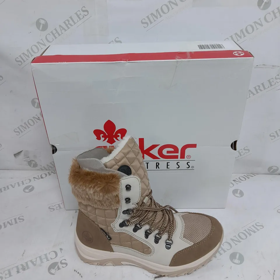 BOXED PAIR OF RIEKER CREAM WINTER FUR HIKE BOOTS IN SIZE 5 