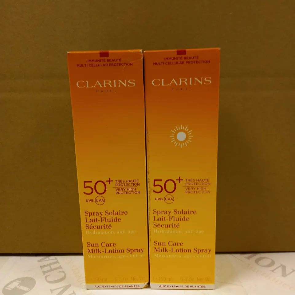 LOT OF 2 CLARINS SUN CARE MILK-LOTION SPRAY