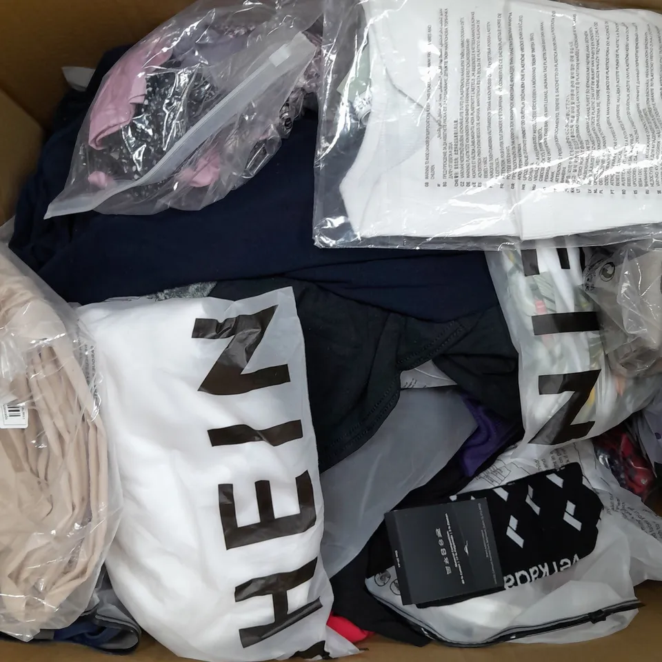 BOX OF APPROXIMATELY 25 ASSORTED CLOTHING ITEMS TO INCUDE - PANTS, HATS , SOCKS , TOPS - ETC
