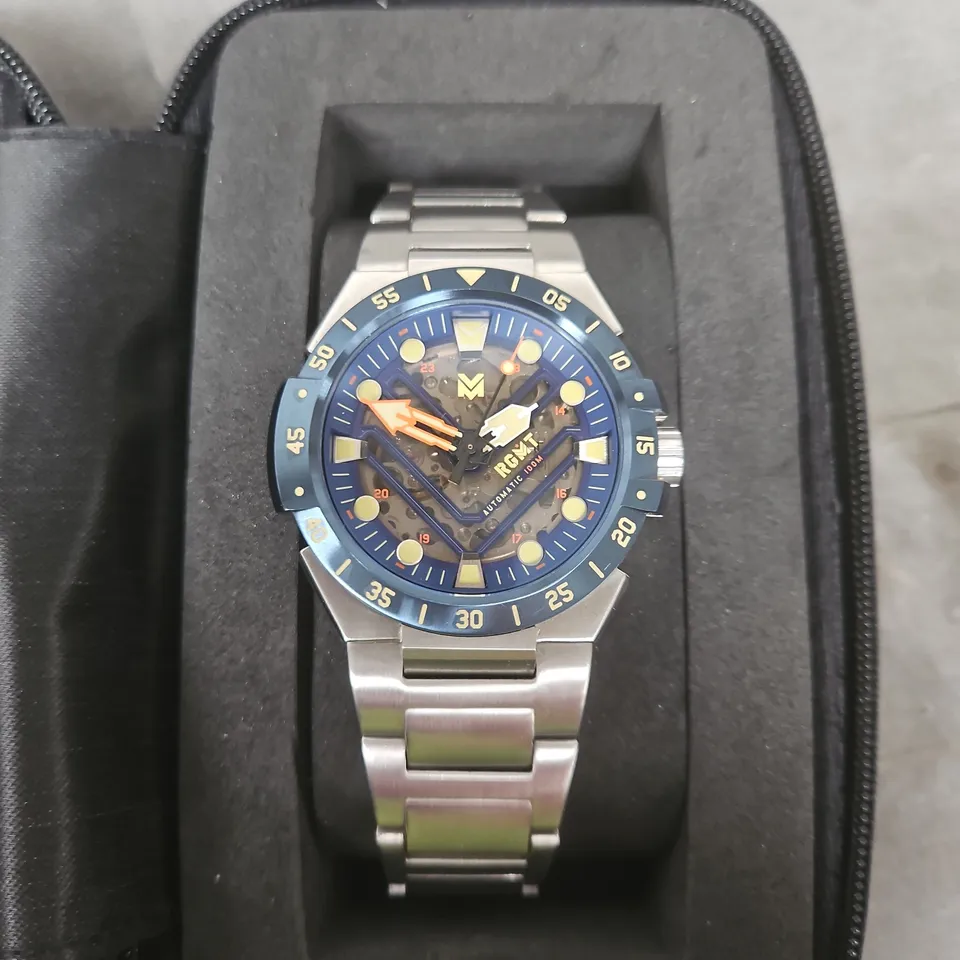 RGMT STAINLESS STEEL WATCH WITH BLUE BEZEL – SKELETON DIAL