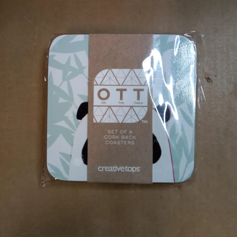 BOX OF APPROXIMATELY 80 PACKS OF CREATIVE TOPS SET OF 4 CORK BACKED COASTERS IN A PANDA DESIGN 