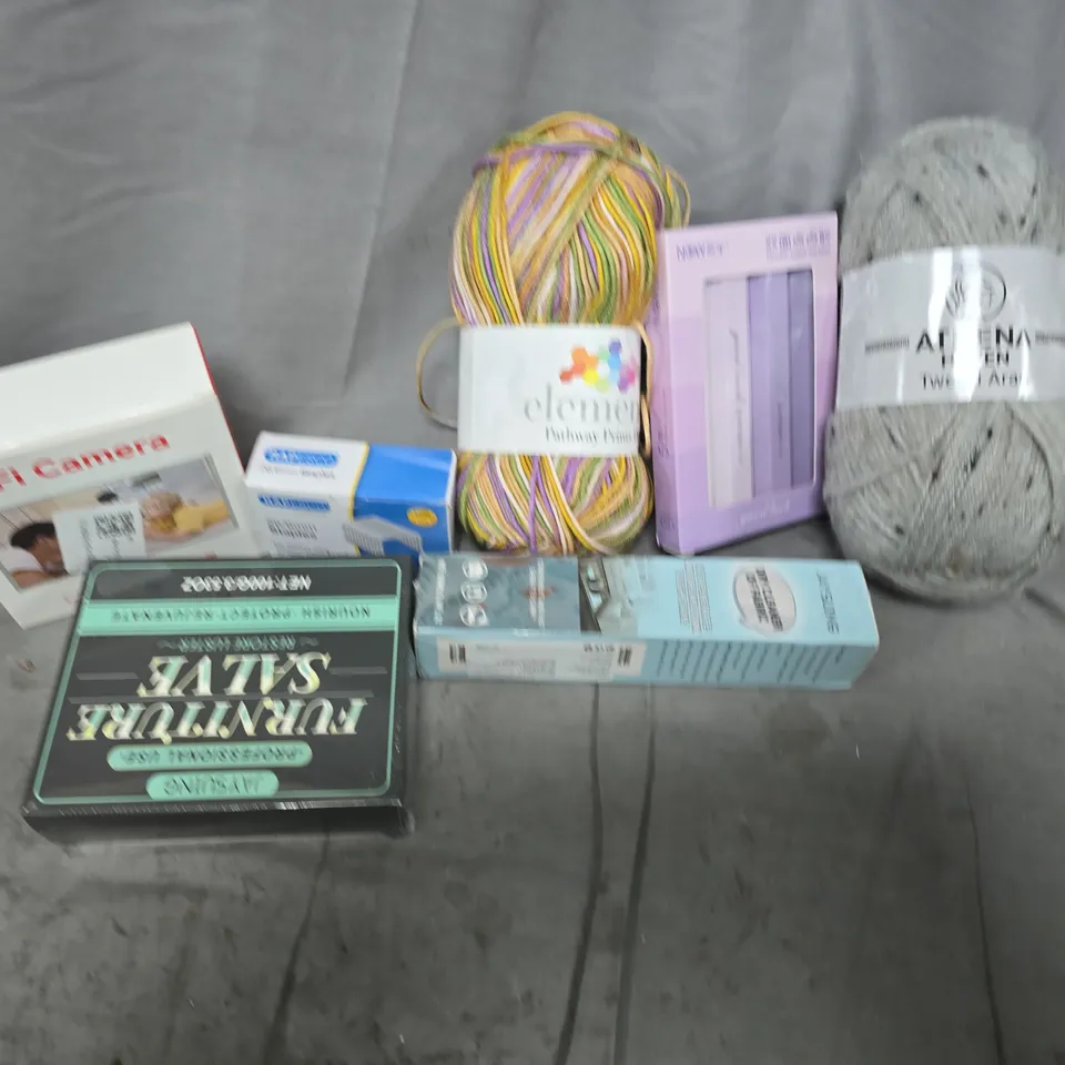 APPROXIMATELY 12 ASSORTED HOUSEHOLD ITEMS TO INCLUDE RAPESCO STAPLES, FURNITURE SALVE, WIFI CAMERA, ETC