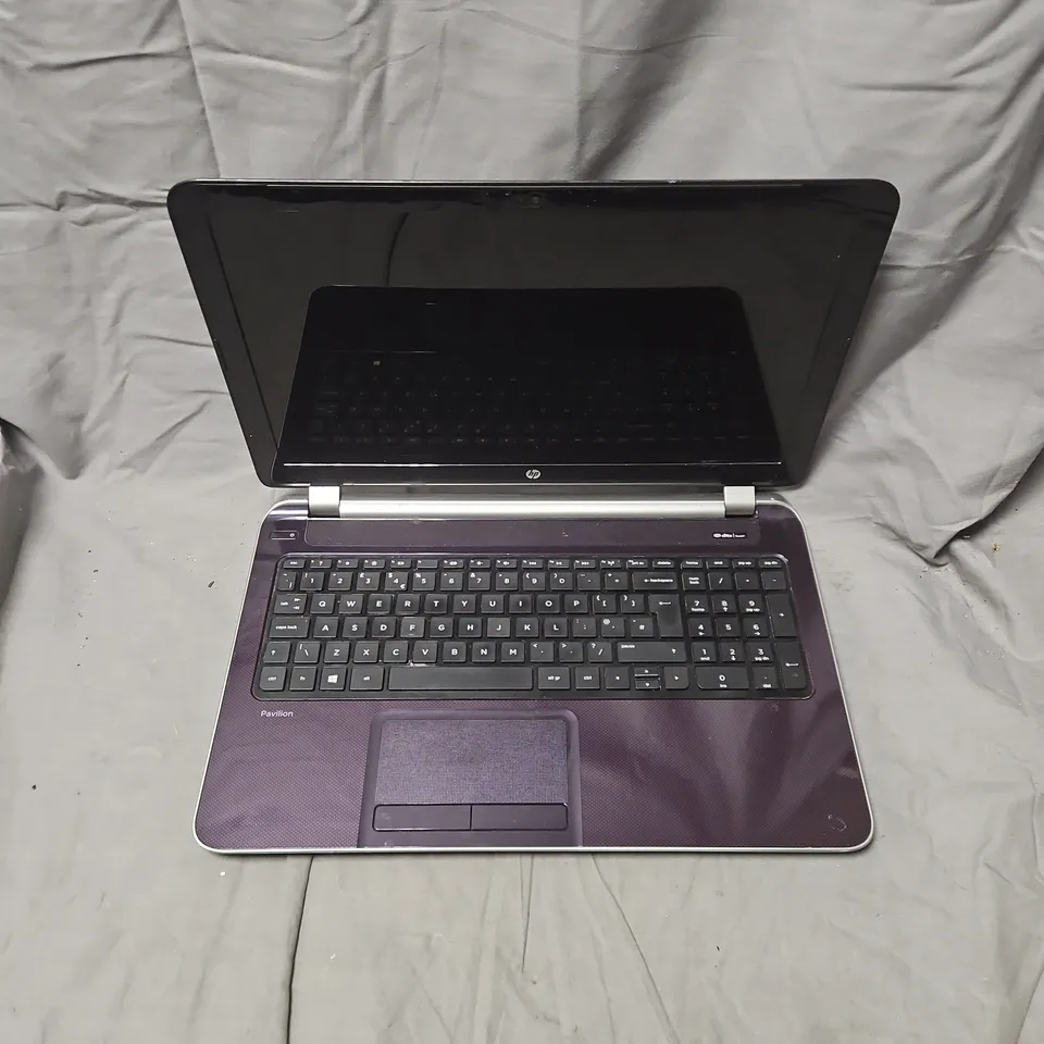 HP PAVILION 15-N271CA LAPTOP – PURPLE
