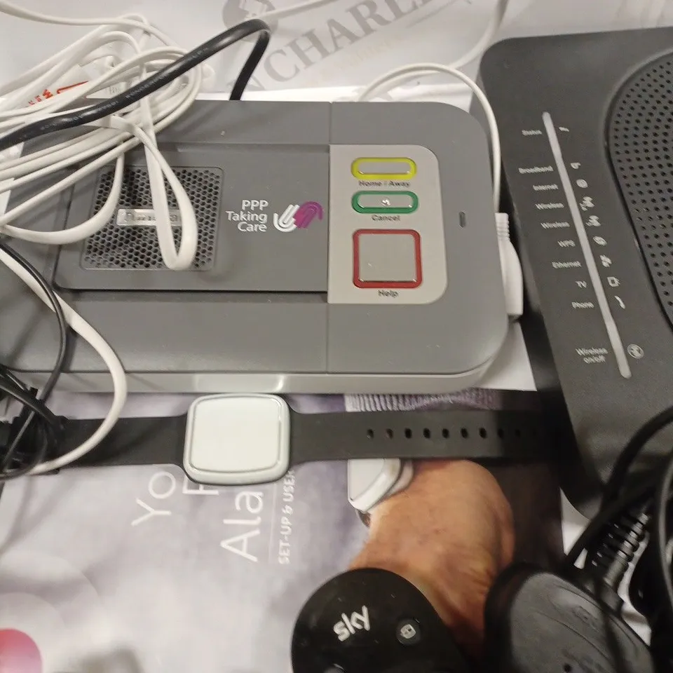 LOT OF ASSORTED TECH ITEMS TO INCLUDE VARIOUS ROUTERS, CABLE, CHARGERS AND TUNSTALL FALL SYSTEM