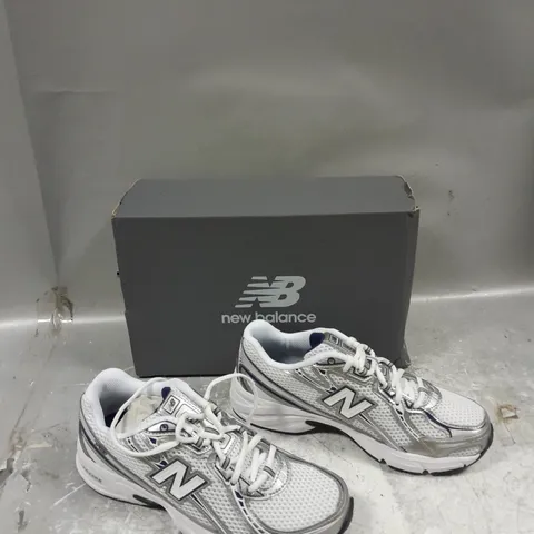 BOXED PAIR OF NEW BALANCE 740 SILVER UK 5