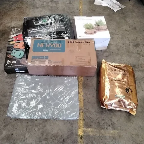 PALLET OF ASSORTED ITEMS TO INCLUDE: BALANCE BIKE, UKULELE, SHERPA SOFA COVERS, WILLOW TEACUP PLANTERS, BASMATI RICE ECT