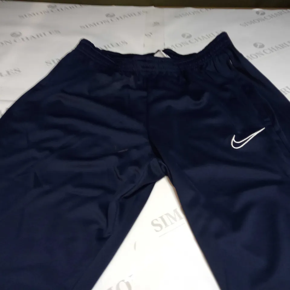 NIKE ACADEMY PANTS IN NAVY - SIZE 10
