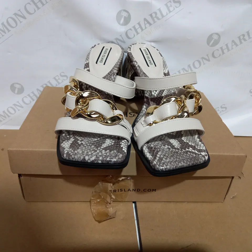 PAIR OF BOXED CREAM WEADGED HEEL SHOES SIZE 7