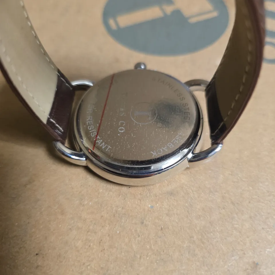TALIS CO WRISTWATCH WITH GREEN FACE & BROWN LEATHER STRAP