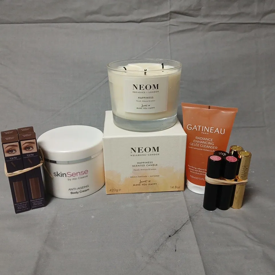 APPROXIMATELY 12 ASSORTED COSMETICS ITEMS TO INCLUDE USED NEOM CANDLE, GATINEAU RADIANCE CLEANSER, SKIN SENSE BODY CREAM, ETC