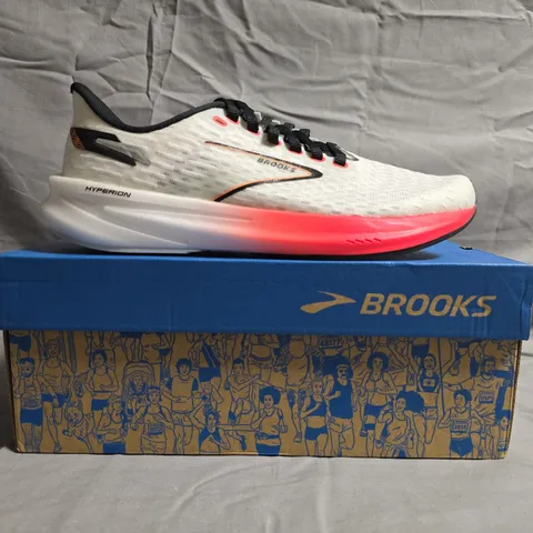 BOXED PAIR OF BROOKS HYPERION TRAINERS IN WHITE/CORAL/ORANGE SIZE UK 5