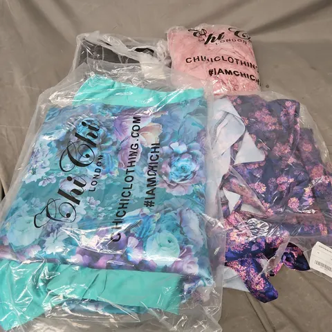 APPROXIMATELY 20 ASSORTED CLOTHING ITEMS IN VARIOUS STYLES AND SIZES 