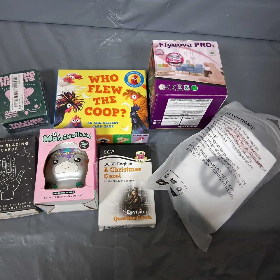 TOTE OF ASSORTED TOYS AND ACCESSORIES TO INCLUDE; PALM READING CARDS, WHO FLEW THE COOP AND FLYNOVA PRO