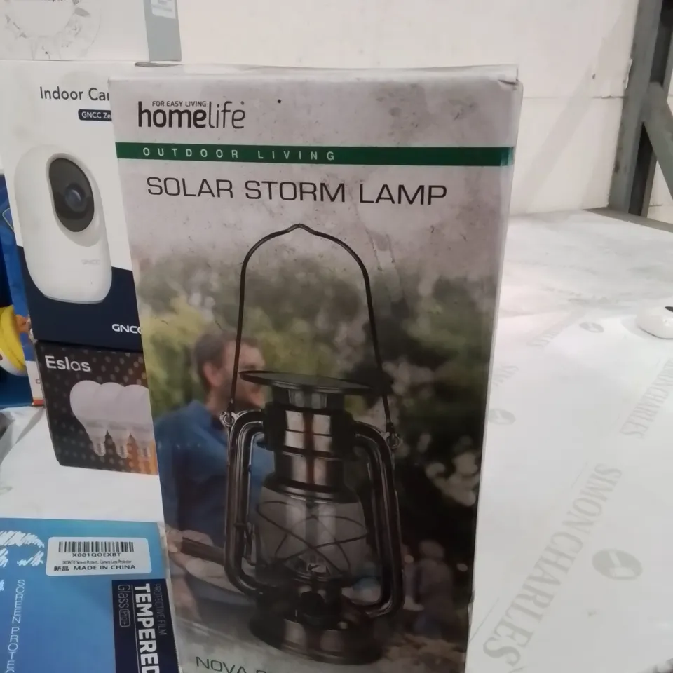 BOX CONTAINING LARGE AMOUNT OF BOXED ELECTRICAL ITEMS TO INCLUDE: INDOOR CAMERA, INK CARTRIDGES, PHONE CASES, SONY FM RADIO, KIDS HEADPHONES ETC.