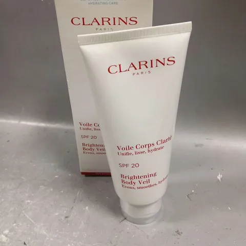 BOXED CLARINS SPF 20 BRIGHTENING BODY VEIL 200ML