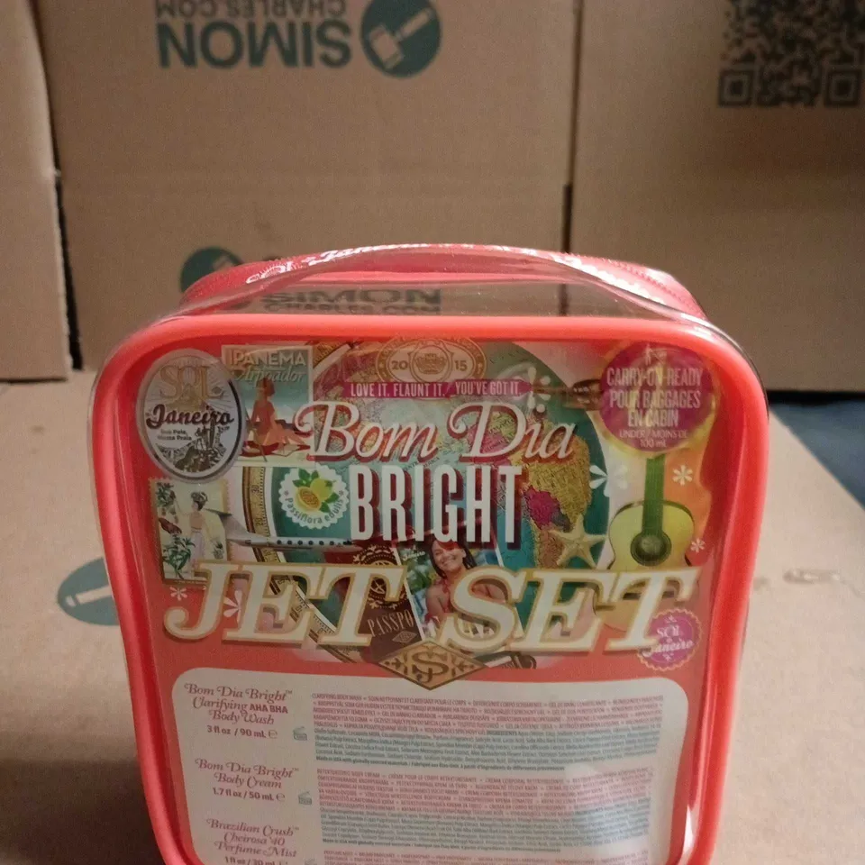 SOL DE JANEIRO BOM DIA BRIGHT JET SET TRAVEL KIT – ORANGE ZIP COSMETIC BAG WITH MINI BODY CARE BOTTLES