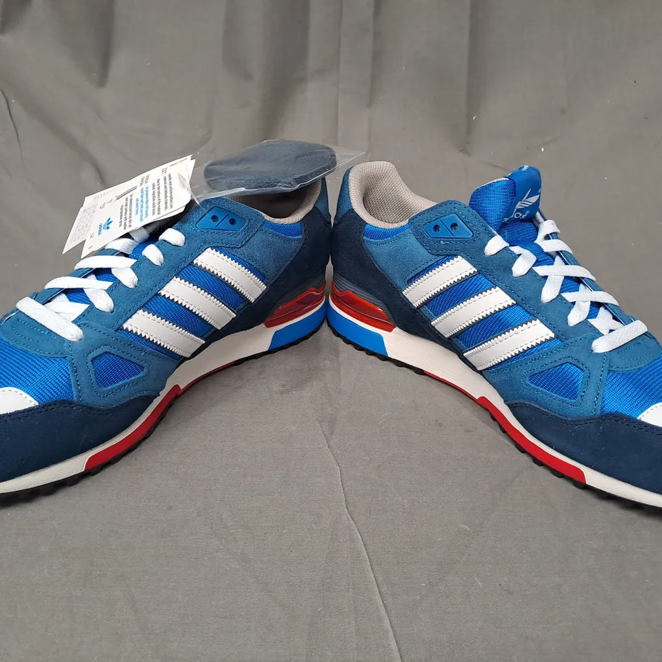 BOXED PAIR OF ADIDAS ZX750 SHOES IN BLUE/WHITE/RED UK SIZE 10
