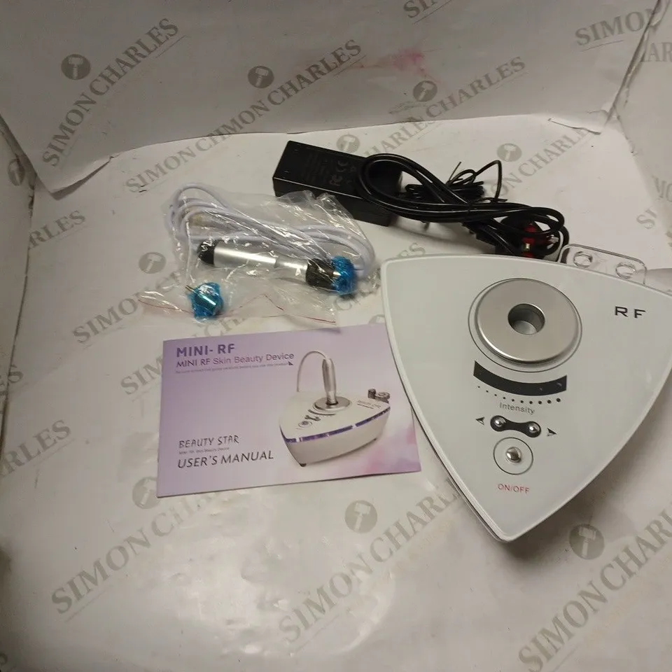 BOXED MINI RF BEAUTY DEVICE FOR SKIN REJUVENATION AND TO STIMULATE COLLAGEN, WITH INSTRUCTION MANUAL