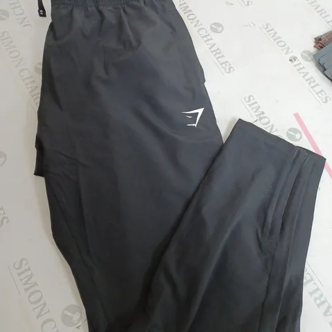 MENS GYMSHARK TRACKSUIT BOTTOMS IN BLACK - SIZE MEDIUM