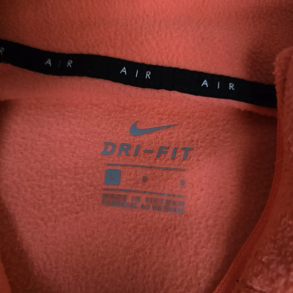NIKKE DRI-FIT QUARTER ZIP IN ORANGE - LARGE