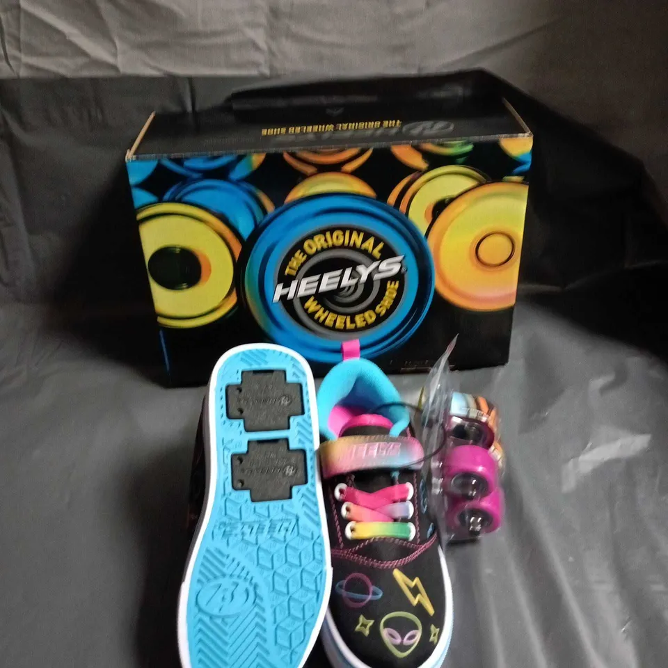 HEELYS THE ORIGINAL WHEELLED SHOE - KIDS' SNEAKERS, BLACK WITH NEON SPACE PATTERN - SIZE UK CHILD 11