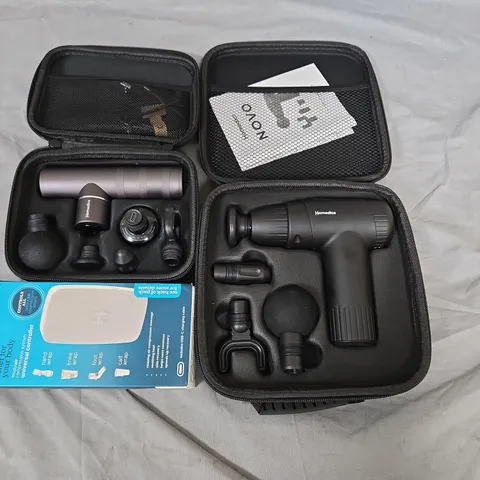 lot of approximately 15 assorted homedics items to include massagers and universal controllers