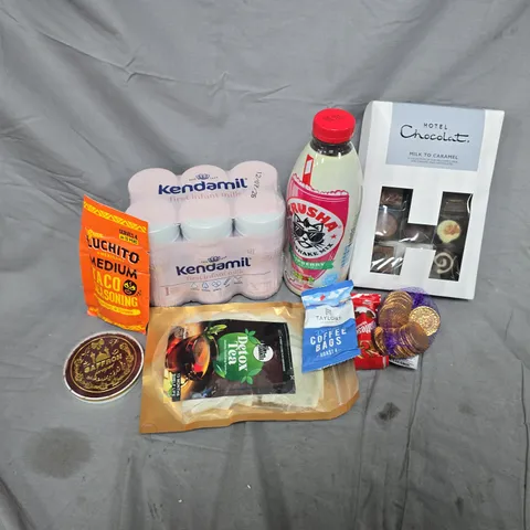 APPROXIMATELY 12 ASSORTED FOOD & DRINK ITEMS TO INCLUDE KENDAMIL FIRST INFANT MILK, CRUSHA RASPBERRY FLAVOUR, HOTEL CHOCOLAT MILK TO CARAMEL, ETC - COLLECTION ONLY