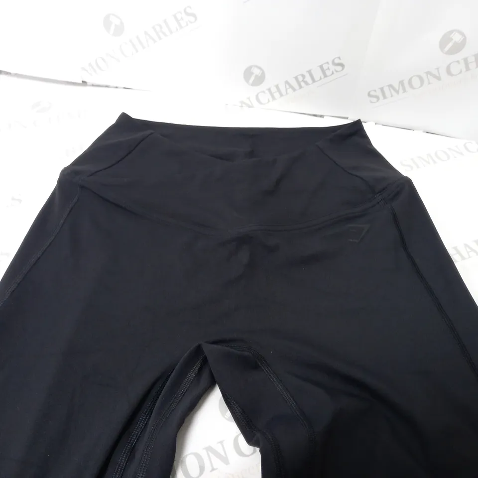 GYMSHARK CROSSOVER FLARED LEGGINGS TALL IN BLACK - MEDIUM
