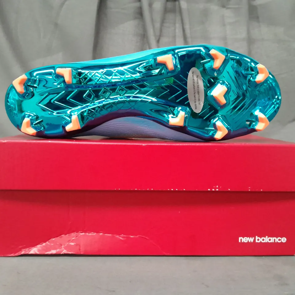 BOXED PAIR OF NEW BALANCE FURON FOOTBALL BOOTS IN SKY BLUE/ORANGE UK SIZE 10.5