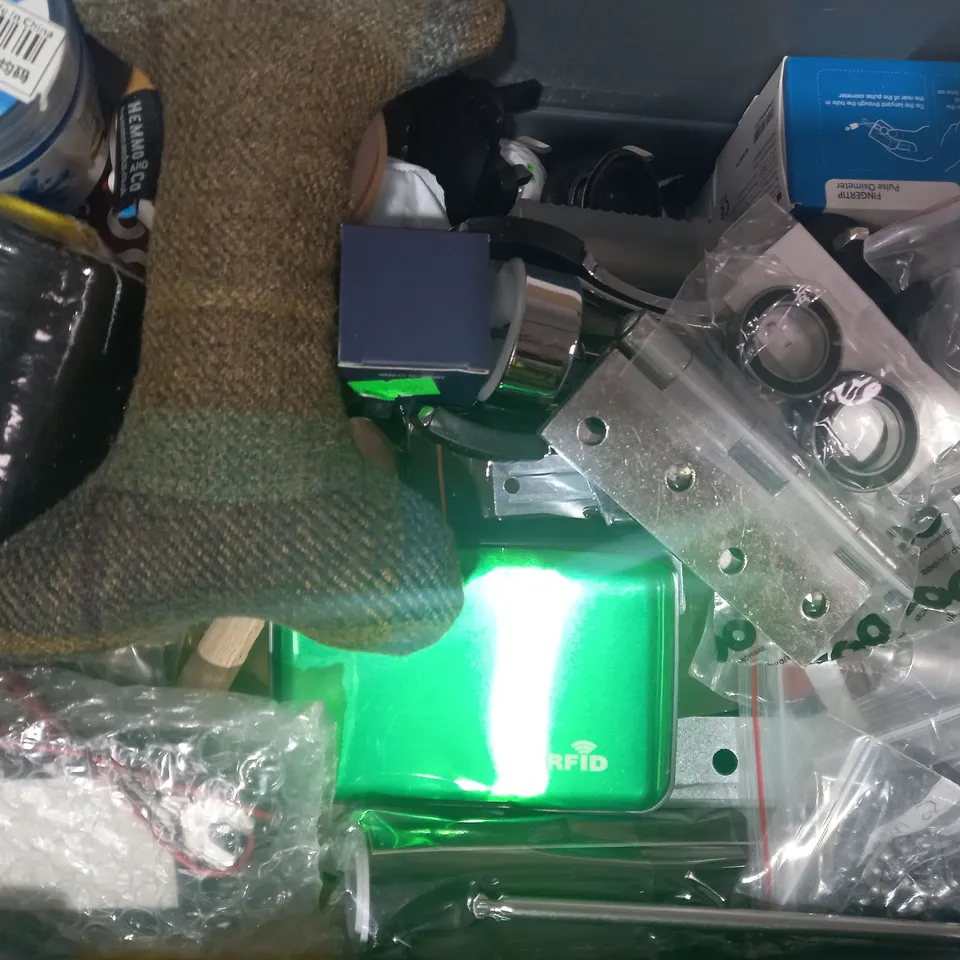 LOT OF APPROXIMATELY 15 ASSORTED HOUSEHOLD ITEMS TO INCLUDE TV REMOTE, BLUETOOTH REMOTE WITH STB CONTROLS, PLAYING CARDS, ETC