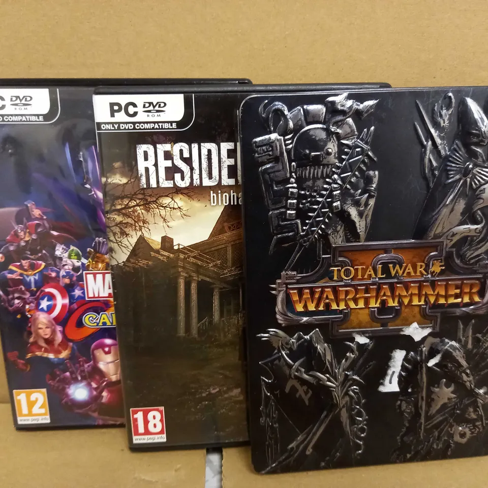 LOT OF 3 GAMES: TOTAL WAR WARHAMMER (STEELBOOK), RESIDENT EVIL VII BIOHAZARD, MARVEL VS CAPCOM