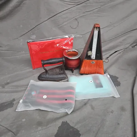 APPROXIMATELY 12 ASSORTED HOUSEHOLD ITEMS TO INCLUDE METRONOME, COIN COLLECTION BOOK, VINTAGE IRON, ETC