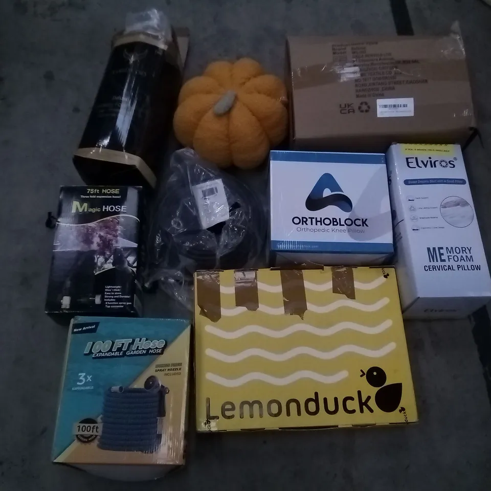 PALLET OF ASSORTED ITEMS INCLUDING ELVIROS MEMORY FOAM CERVICAL PILLOW, ORTHOBLOCK ORTHOPEDIC KNEE PILLOW, 100FT HOSE, PUMPKIN PLUSH, SOFSLEE PILLOW 2PK, EAWONGEE DRAIN HOSE