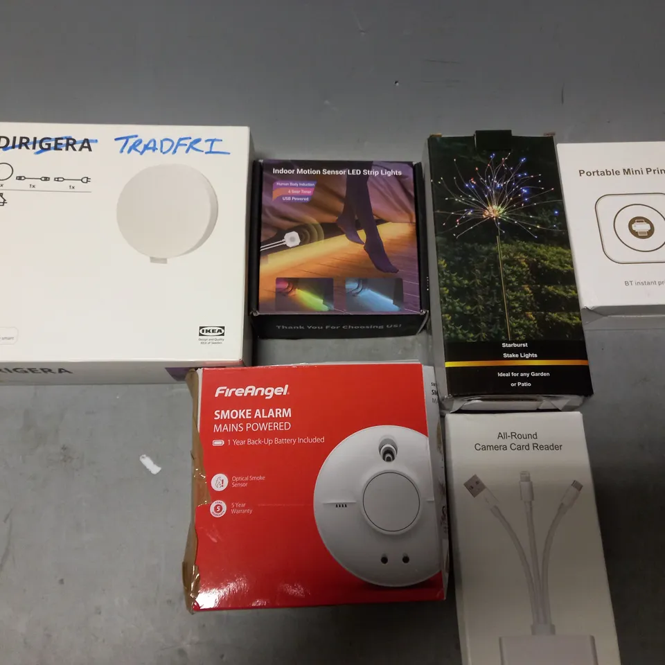 BOX OF APPROXIMATELY 12 ASSORTED ITEMS TO INCLUDE - INDOOR MOTION SENSOR LED STRIP LIGHTS , PORTABLE MINI PRINTER , FIREANGLE SMOKE ALARM ETC