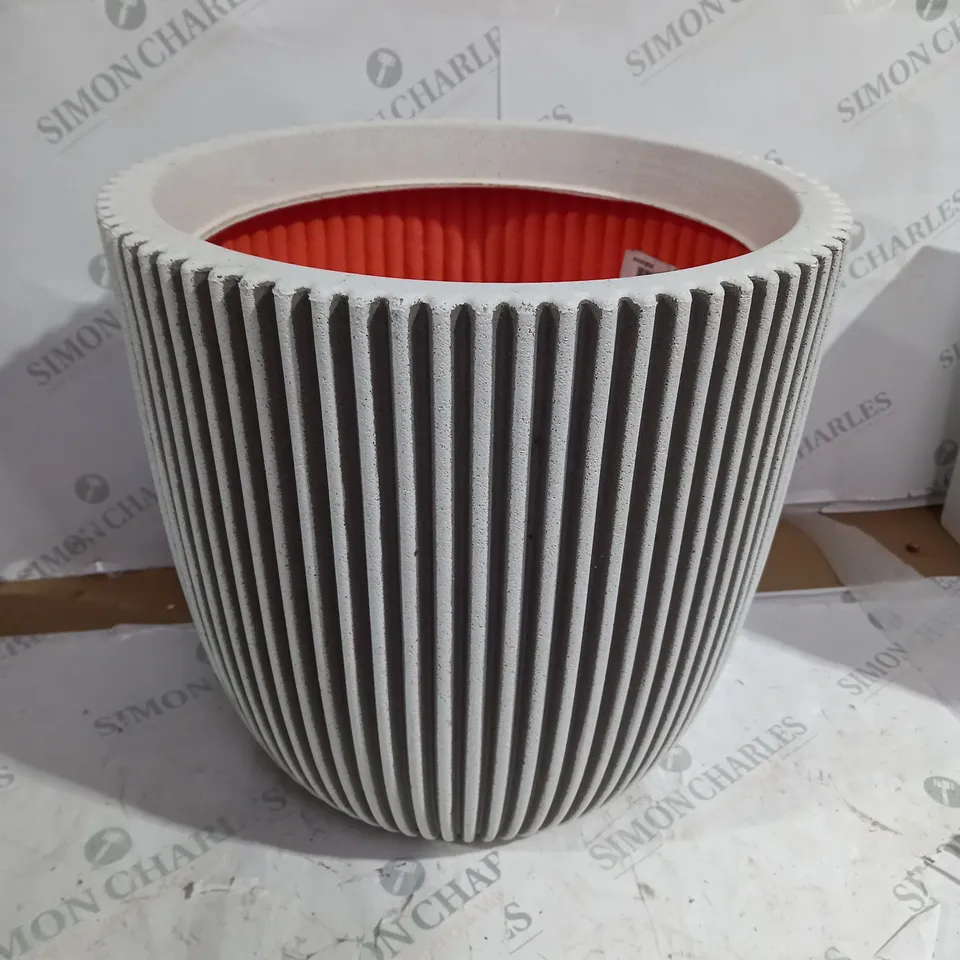 UNBRANDED IVORY PLANT POT WITH BLACK GLASS PEBBLES 