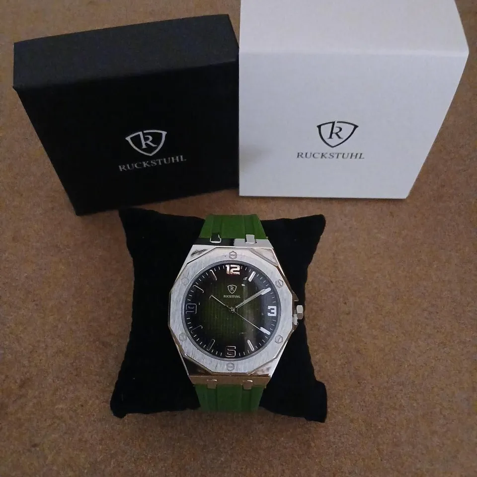 RUCKSTUHL WRISTWATCH WITH GREEN RUBBER STRAP – BLACK DIAL