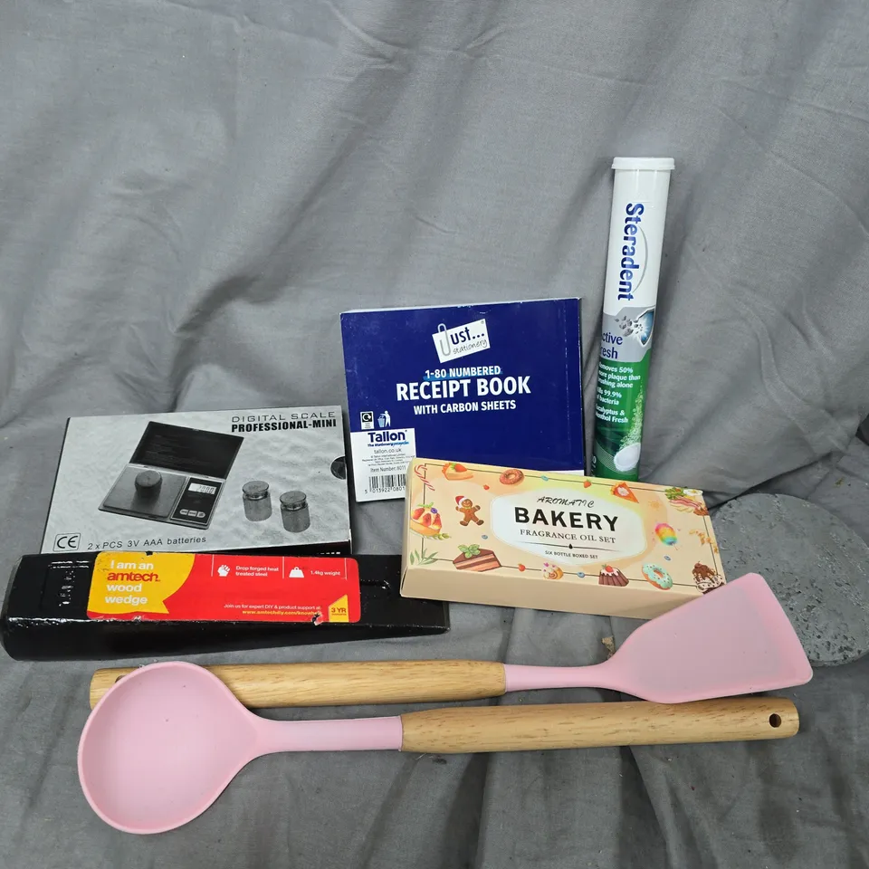 APPROXIMATELY 15 ASSORTED HOUSEHOLD ITEMS TO INCLUDE BAKERY FRAGRANCE OIL SET, RECEIPT BOOK, AMTECH WOOD WEDGE, ETC