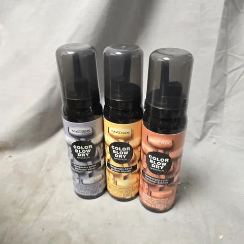 APPROXIMATELY 20 ASSORTED MATRIX BLOW DRY SPRAYS TO INCLUDE CARAMEL BLONDE, PLATINUM SILVER, GOLDEN BLONDE, ETC - COLLECTION ONLY