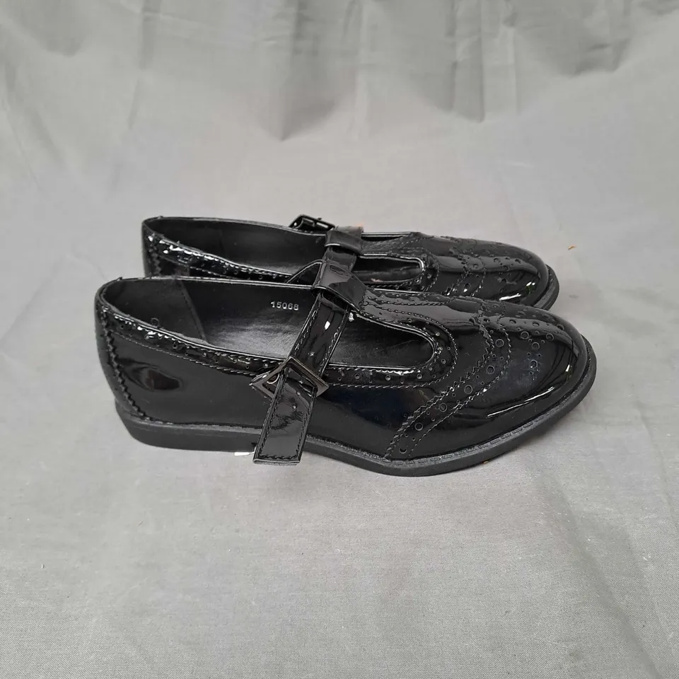 BOX OF APPROXIMATELY 12 PAIRS OF GIRLS SCHOOL SHOES IN BLACK - VARIOUS SIZES