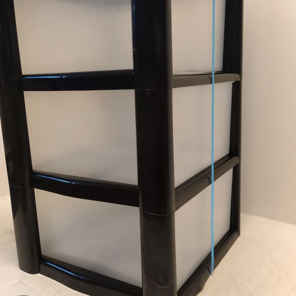 4-DRAWER PLASTIC STORAGE CABINET ON BLACK FRAME WITH CLEAR DRAWERS – DAMAGED TOP CORNER