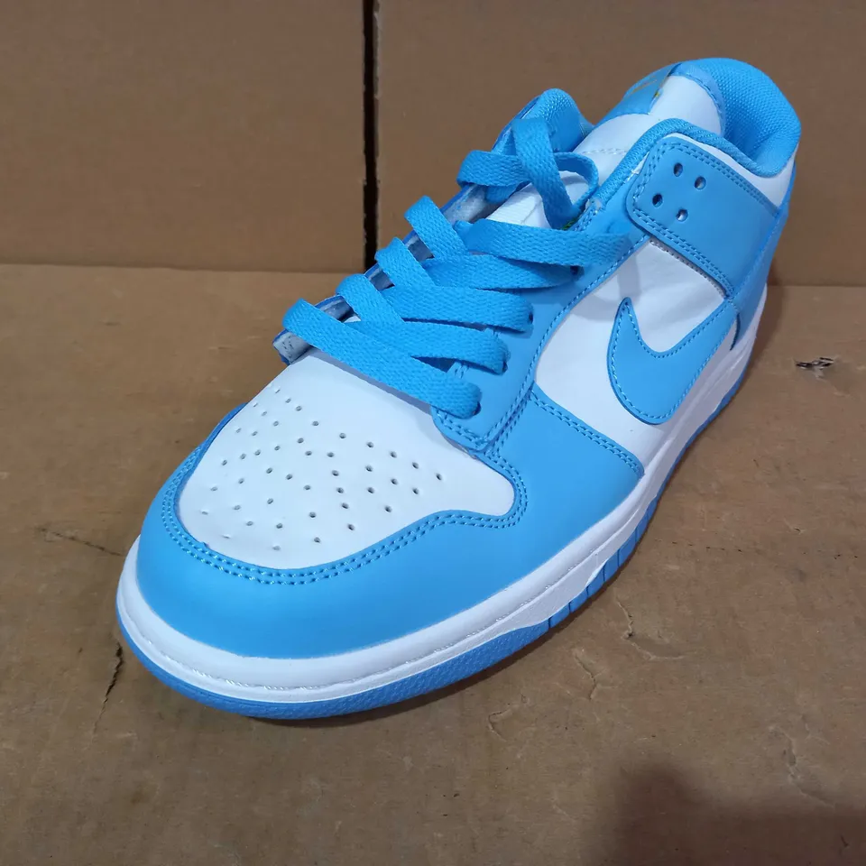 PAIR OF  DESIGNER SHOES IN THE STYLE OF NIKE IN BLUE/WHITE UK SIZE 7