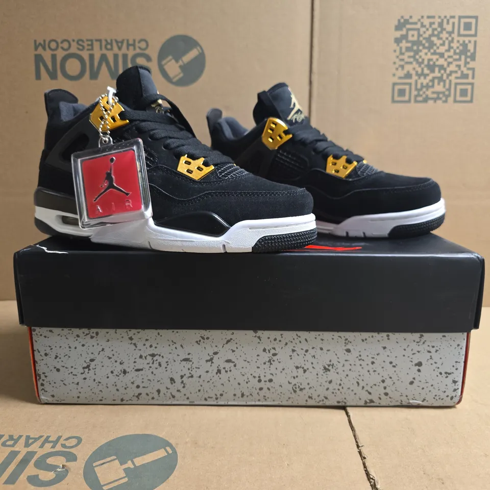 BOXED PAIR OF NIKE WOMEN'S AIR JORDAN 4 RETRO SHOES IN BLACK/METALLIC GOLD SIZE UK 4.5