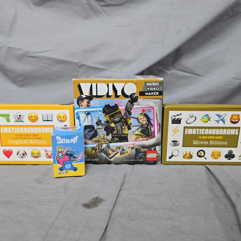 APPROXIMATELY 10 ASSORTED TOYS AND GAMES TO INCLUDE STICH DOLL, FLASH CARD GAME, ETC