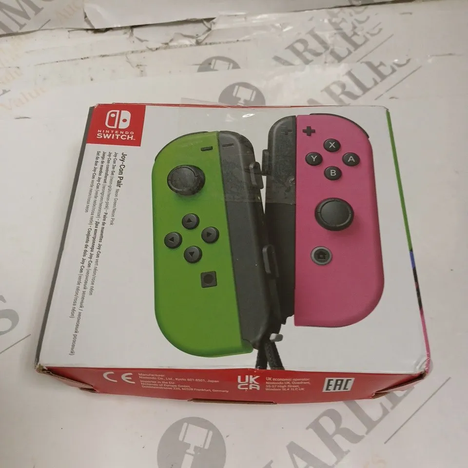BOXED NINTENDO SWITCH CONTROLLER - GREEN & PINK