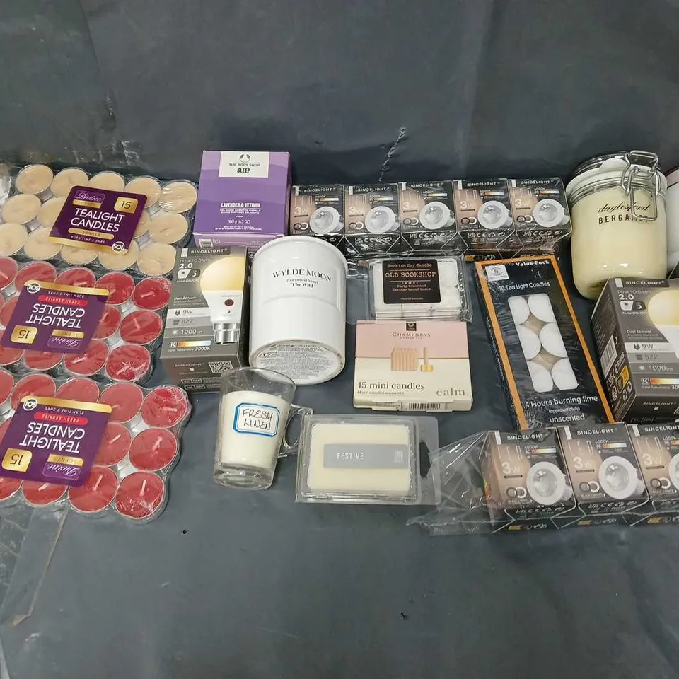 APPROXIMATELY 12 ASSORTED ITEMS TO INCLUDE - TEALIGHT CANDLES, CANDLE MELTS, AND BULBS ETC.