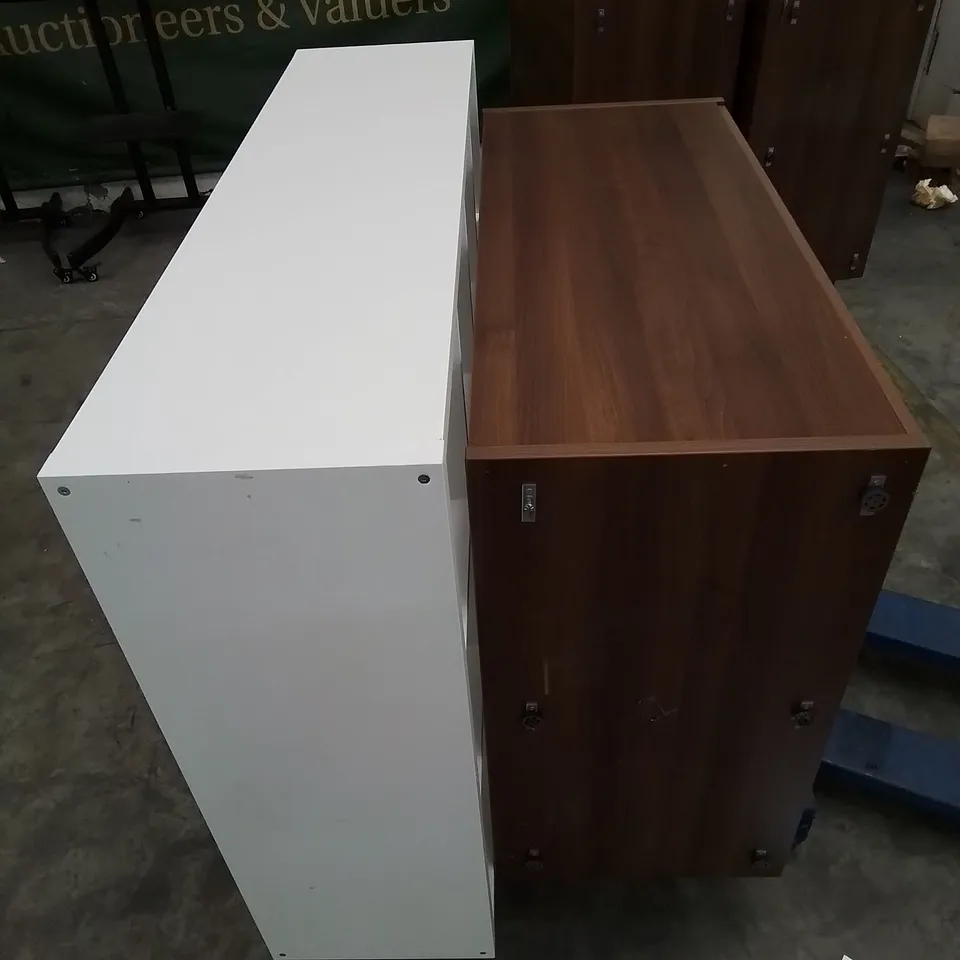 PALLET CONTAINING A LARGE 2 DOOR CABINET AND A 12 SPACE WHITE STORAGE UNIT