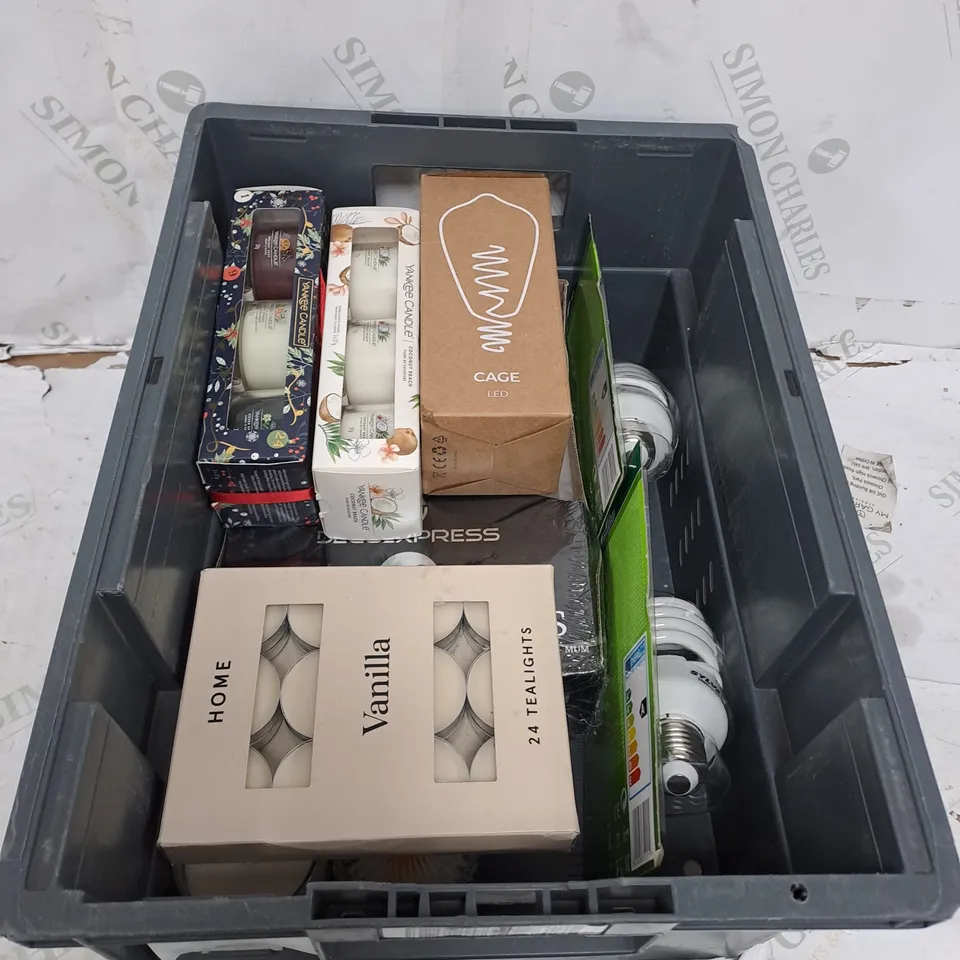 TOTE OF ASSORTED HOUSEHOLD ITEMS TOO INCLUDE CANDLES , LIGHT BULBS , ETC 
